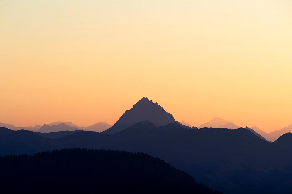 Laptop and desktop side by side on a desk