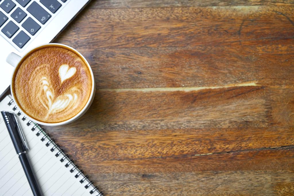 Modern technology workspace with laptop and desktop computers